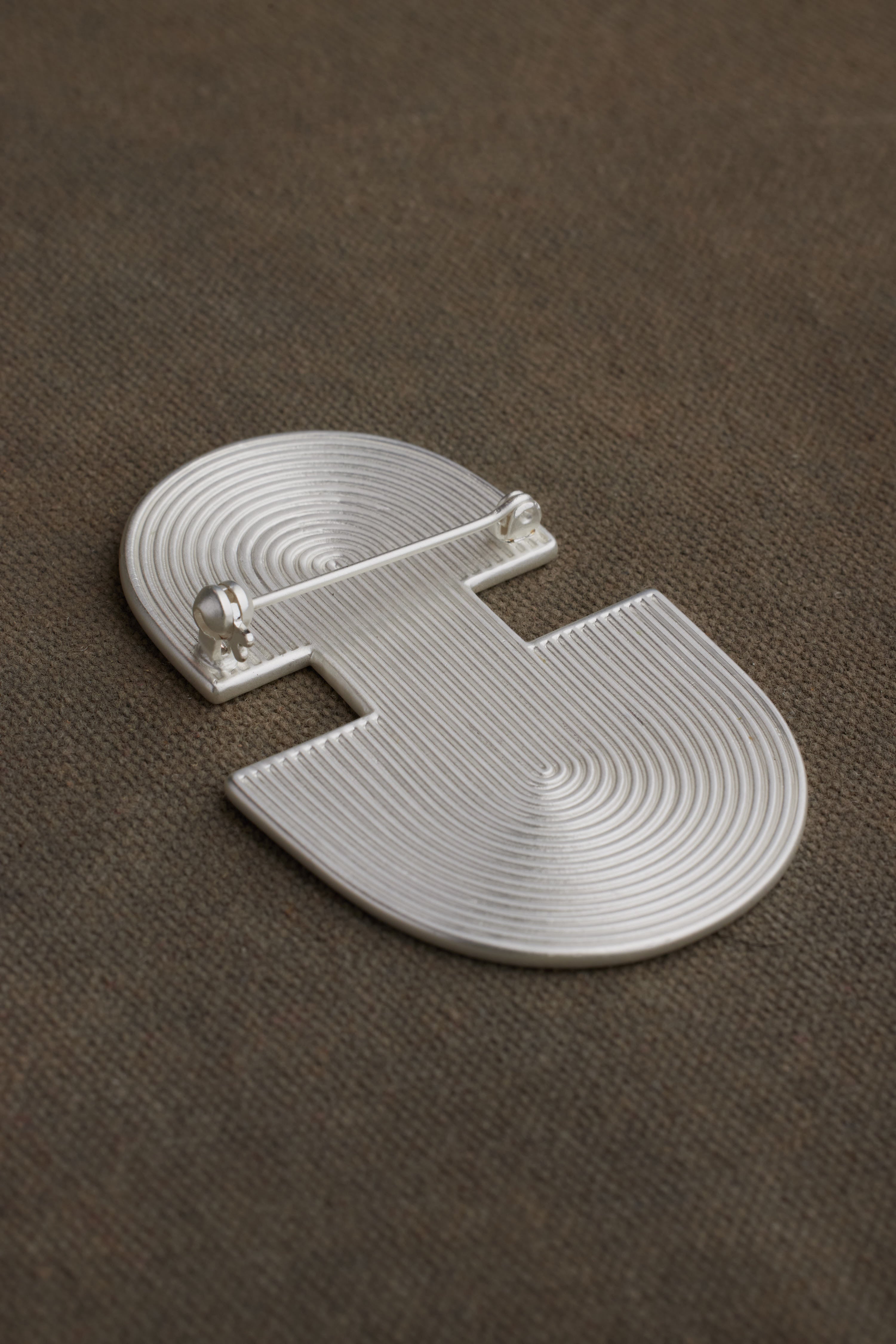 TYAN BROOCH